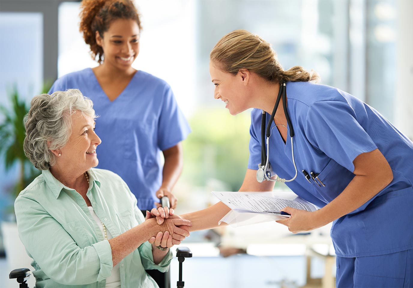 nurses thanking patient for coming in