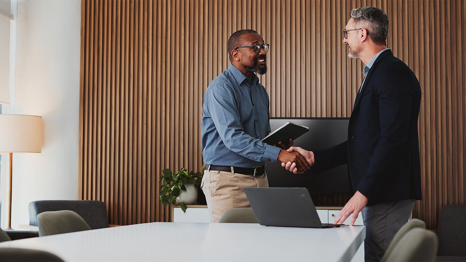 men shaking hands during business partnership